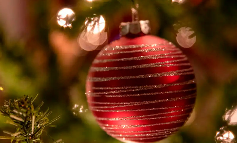 Manos que tejen Navidad