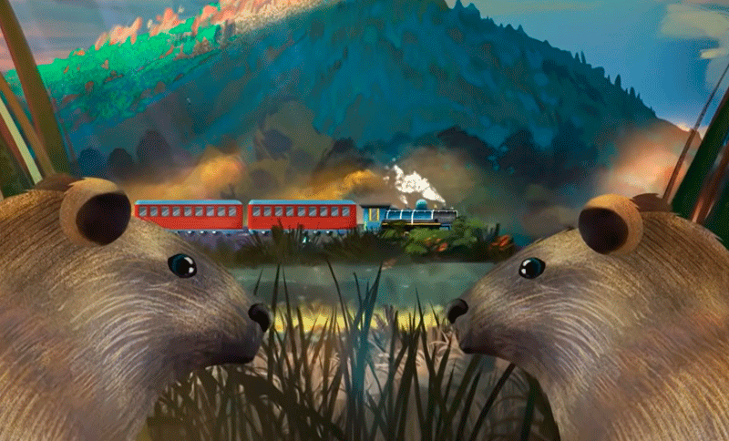 Animales en primer plano con un tren de fondo