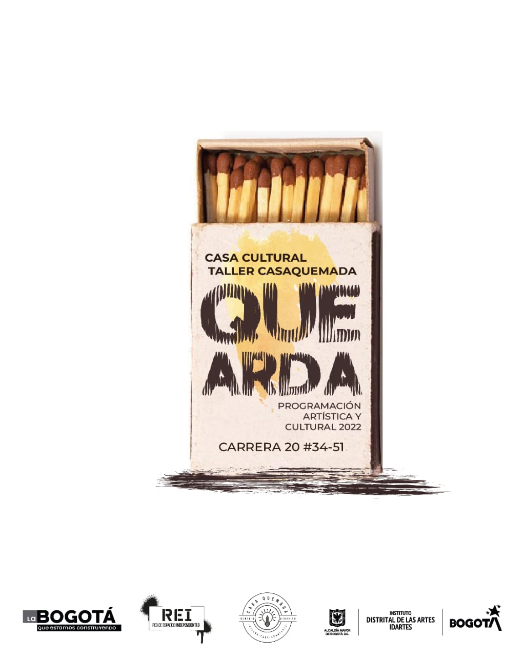 Caja de fósforos de madera con el nombre de la programación y su ubicación.