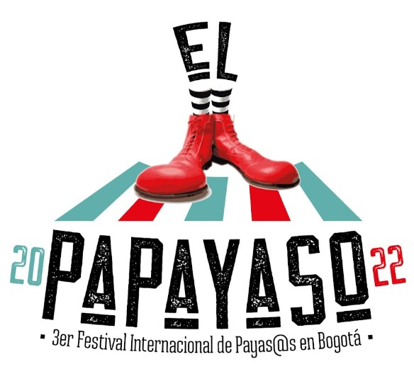 Flyer del evento. Cuenta en la parte superior con unos zapatos de payaso de color rojo aobre un zebra peatonal de color azul y rojo intercalado. En la parte inferior viene el texto 20 papayaso 22