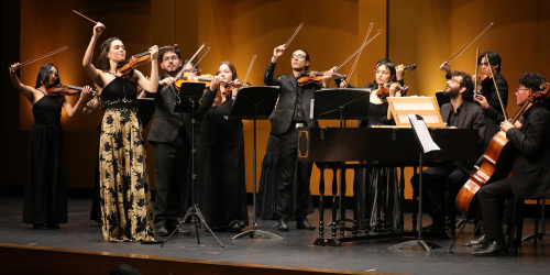 violinistas en escena